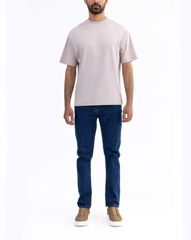 Men wearing a premium organic cotton T-shirt in a casual outdoor setting