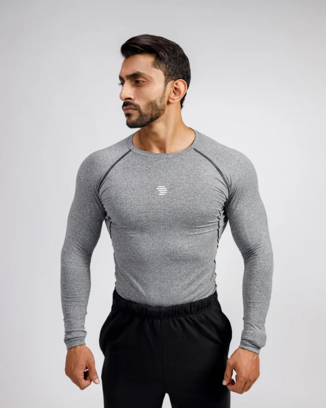 Men's Compression Top in breathable, moisture-wicking fabric enhancing athletic performance.