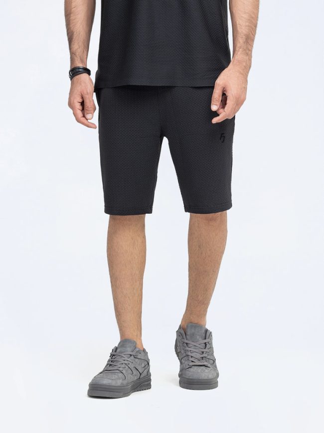 Men's Performance Gym Shorts in lightweight, quick-dry fabric with 5-inch inseam, elastic waistband, and zippered pockets.