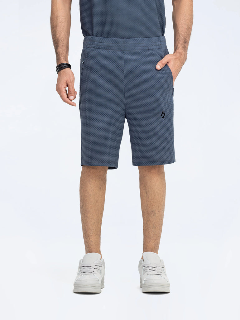 Men's Performance Gym Shorts in lightweight, quick-dry fabric with 5-inch inseam, elastic waistband, and zippered pockets.