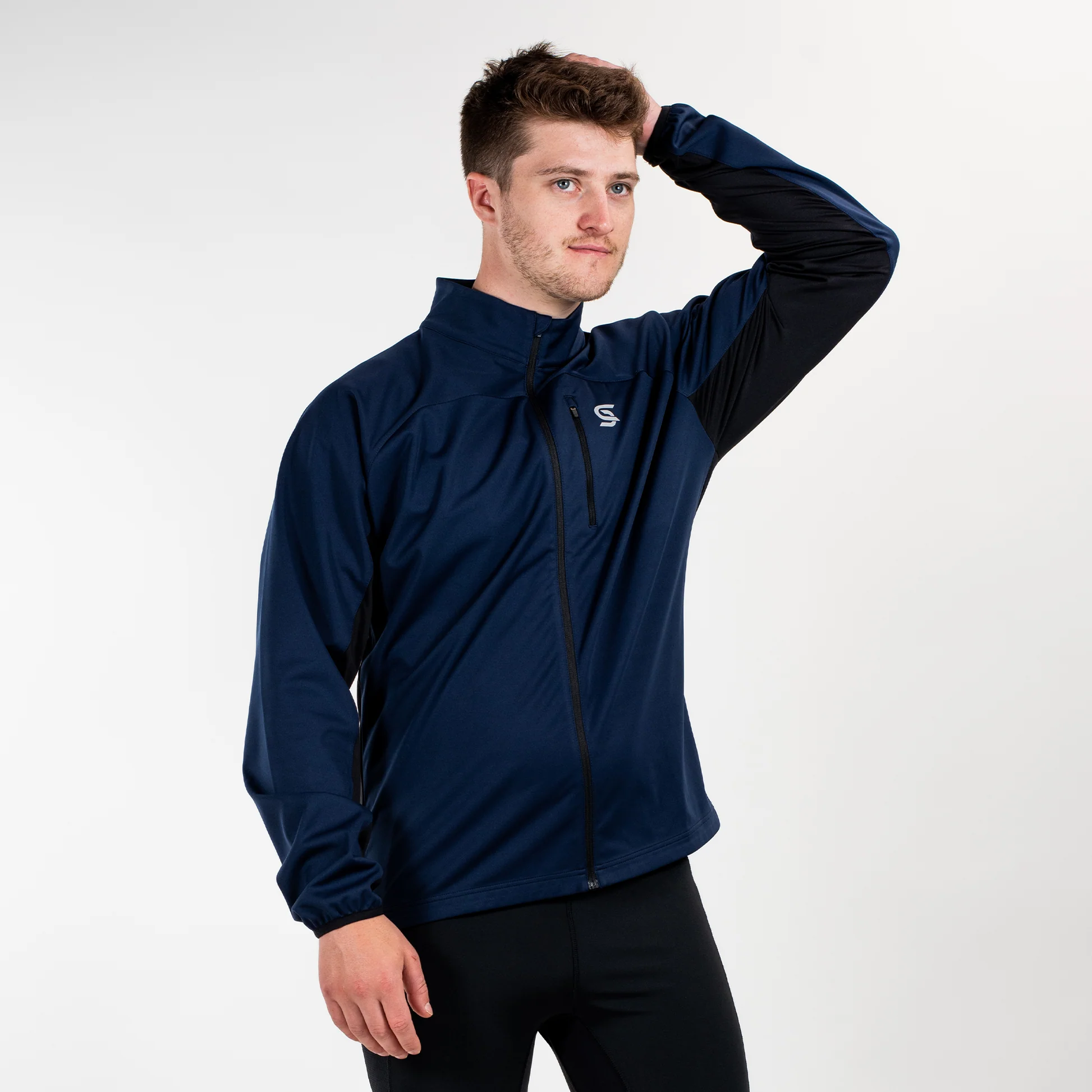 Men wearing a versatile 3-in-1 waterproof jacket during an outdoor adventure.