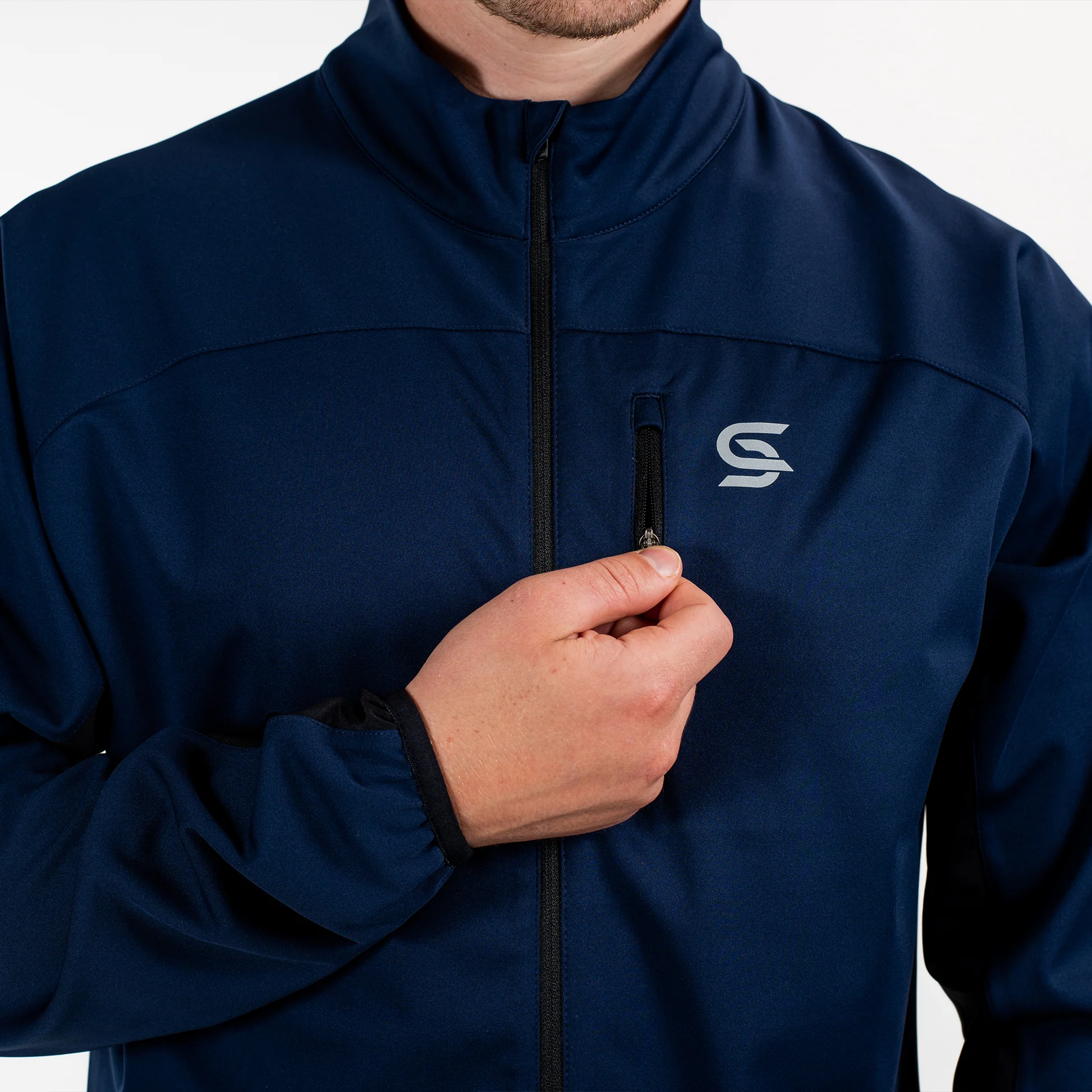 Men wearing a versatile 3-in-1 waterproof jacket during an outdoor adventure.