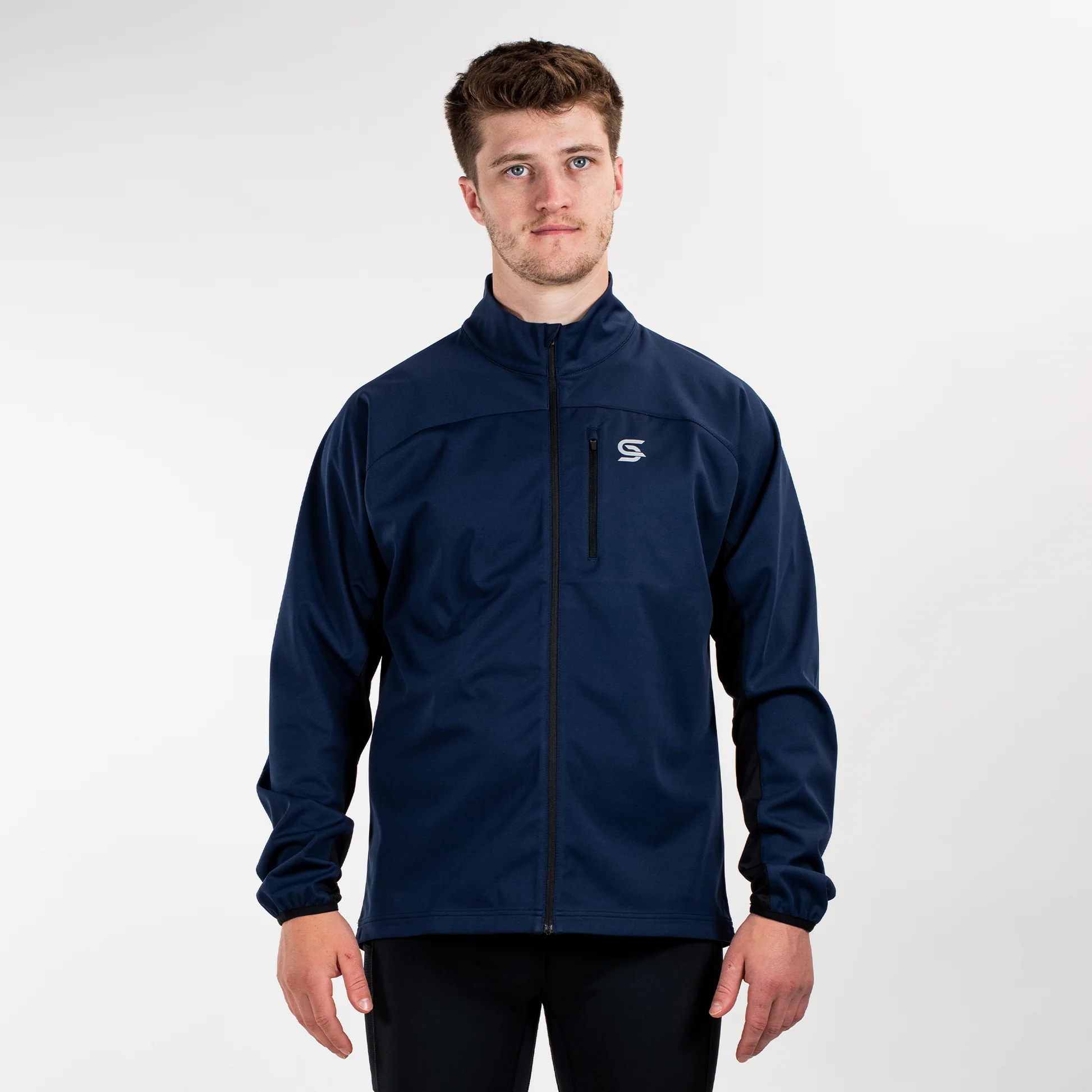 Men wearing a versatile 3-in-1 waterproof jacket during an outdoor adventure.