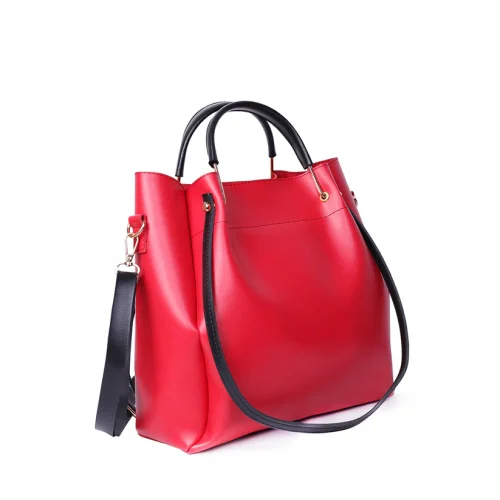 Elegant women's genuine leather handbag with classic design and spacious interior.